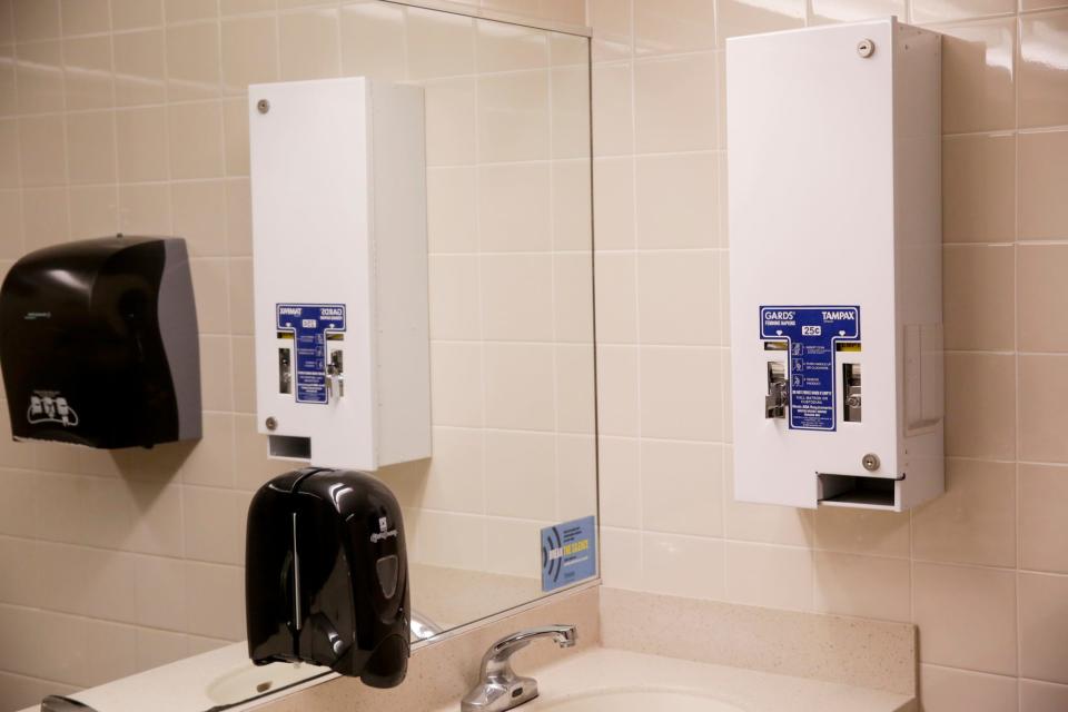 A menstrual product dispenser inside a women's restroom in Purdue University's Stewart Center, Thursday, Feb. 6, 2020, in West Lafayette.