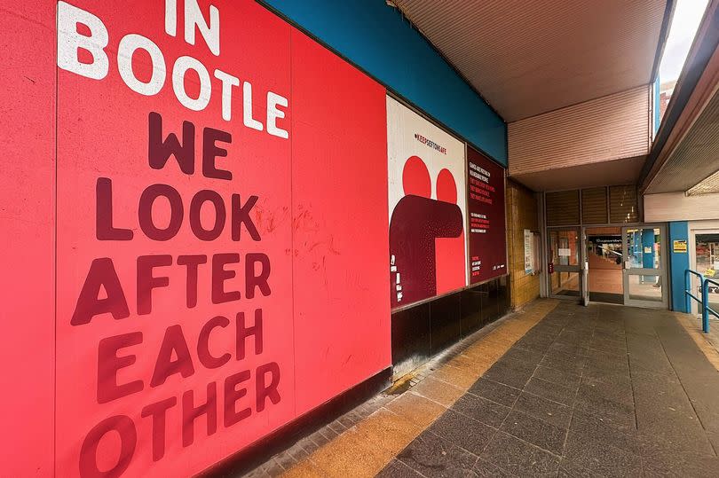 'We Look After Each Other' sign in Bootle