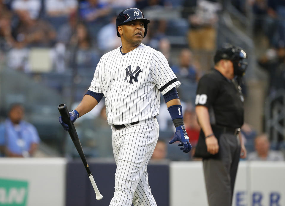 Jun 17, 2019; Bronx, NY, USA; New York Yankees designated hitter Edwin Encarnacion (30) goes to the dugout after striking out against the Tampa Bay Rays in the second inning at Yankee Stadium. Mandatory Credit: Noah K. Murray-USA TODAY Sports