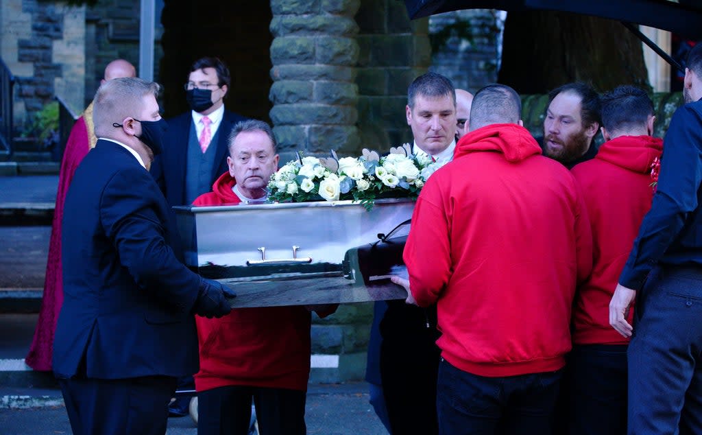 The coffin of Jack Lis is carried into St Martin’s Church, Caerphilly (Ben Birchall/PA) (PA Wire)