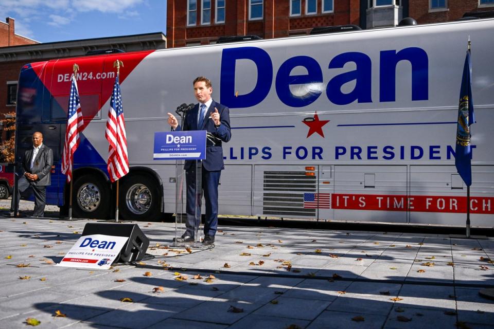 U.S. Rep. Dean Phillips (D-MN)(R) holds a rally outside of the N.H. Statehouse after handing over his declaration of candidacy form for President to the New Hampshire Secretary of State (Getty Images)