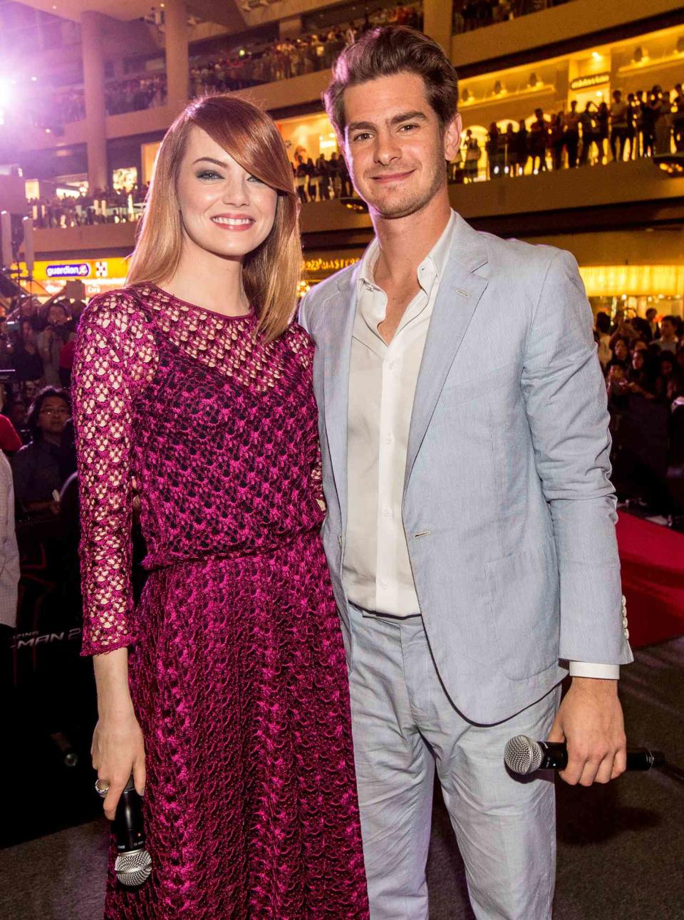 Emma Stone and Andrew Garfield attend "The Amazing Spider-Man 2" Singapore Fan Event at Marina Bay Sands on March 26, 2014 in Singapore. (Photo by Christopher Polk/Getty Images for Sony