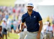Jun 19, 2016; Oakmont, PA, USA; Dustin Johnson after putting on the 10th green during the final round of the U.S. Open golf tournament at Oakmont Country Club. Mandatory Credit: John David Mercer-USA TODAY Sports