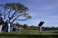 Huey Lewis hits a tee shot during the celebrity challenge event of the AT&T Pebble Beach Pro-Am golf tournament in Pebble Beach, Calif., Wednesday, Feb. 1, 2023. (AP Photo/Eric Risberg)