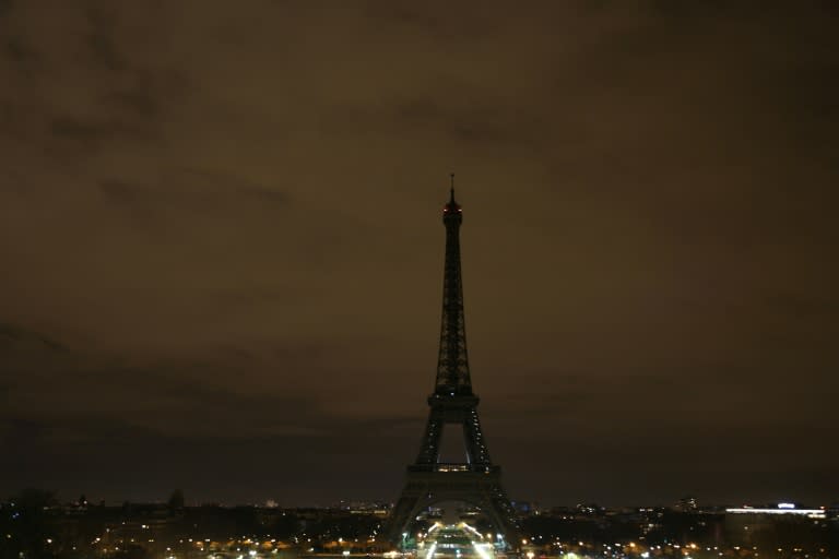 The Eiffel Tower had already turned its lights off on Tuesday night after a series of suicide blasts in Baghdad killed at least 42