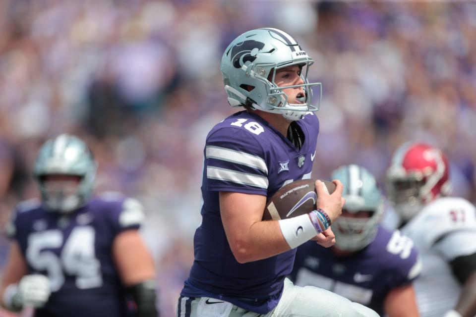 Kansas State senior quarterback Will Howard (18) runs in for a touchdown in the third quarter of Saturday’s game against Troy inside Bill Snyder Family Stadium.