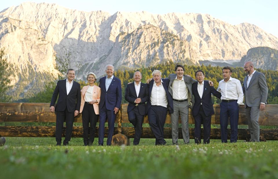 Group of Seven leaders pose during a group photo at the G7 summit at Castle Elmau in Kruen, near Garmisch-Partenkirchen, Germany, on Sunday, June 26, 2022. The Group of Seven leading economic powers are meeting in Germany for their annual gathering Sunday through Tuesday. From left, Italy's Prime Minister Mario Draghi, European Commission President Ursula von der Leyen, U.S. President Joe Biden, German Chancellor Olaf Scholz, British Prime Minister Boris Johnson, Canada's Prime Minister Justin Trudeau, Japan's Prime Minister Fumio Kishida, French President Emmanuel Macron and European Council President Charles Michel. (AP Photo/Markus Schreiber, Pool)