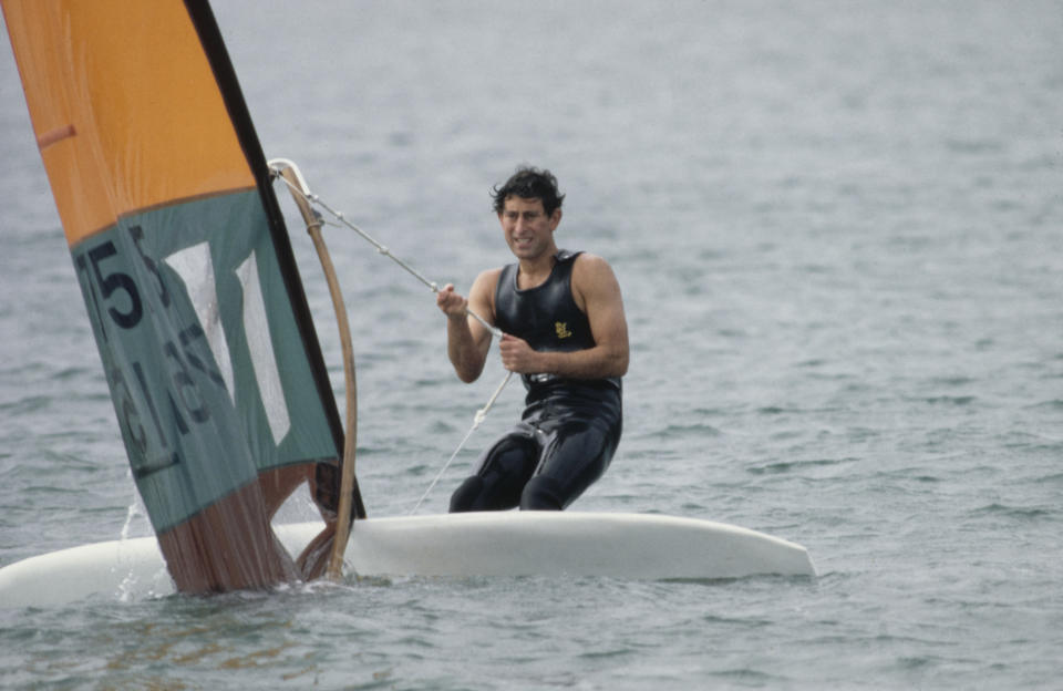 Prince Charles, the Prince of Wales windsurfing at Cowes on the Isle of Wight, UK, 5th August 1980.   (Photo by Tim Graham Photo Library via Getty Images)