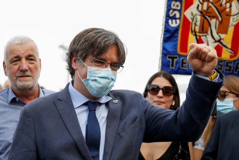 Former Catalan government head Carles Puigdemont walks in Alghero