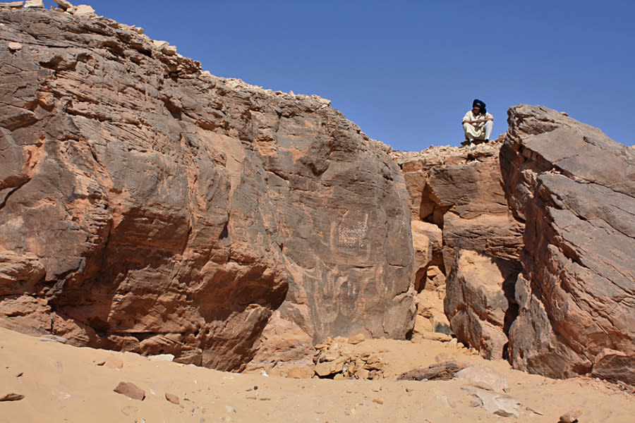 Site 7 at Nag el-Hamdurab is the most elaborate carving, showing a white-crowned king travelling with a flotilla of five boats. (Stan Hendrickx, John Coleman Darnell & Maria Carmela Gatto) <br> <a href="http://www.livescience.com/25359-photos-first-egypt-pharaoh-carvings.html" rel="nofollow noopener" target="_blank" data-ylk="slk:Click here to see the full collection at LiveScience.com;elm:context_link;itc:0;sec:content-canvas" class="link ">Click here to see the full collection at LiveScience.com</a>