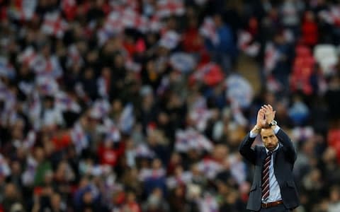 Gareth Southgate applauds the fans at Wembley - Credit: Reuters