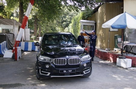 A vehicle carrying Ajay Bisaria, Indian ambassador to Pakistan leaves his residence, after Pakistan announced his expulsion, in Islamabad