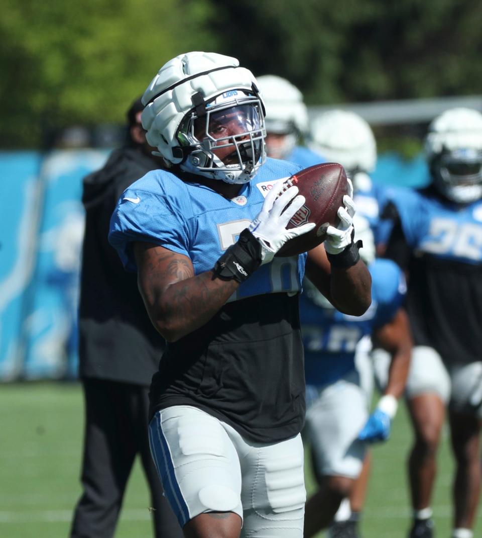 Lions running back Jermar Jefferson makes a catch during the Lions' joint practice with the Jaguars on Wednesday, Aug. 16, 2023, in Allen Park.