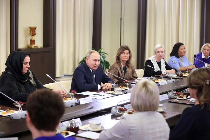 Russian President Vladimir Putin holds a meeting with mothers of Russia's servicemen participating in the military operation in Ukraine, ahead of Mother's Day at the Novo-Ogaryovo state residence, outside Moscow, on November 25, 2022.