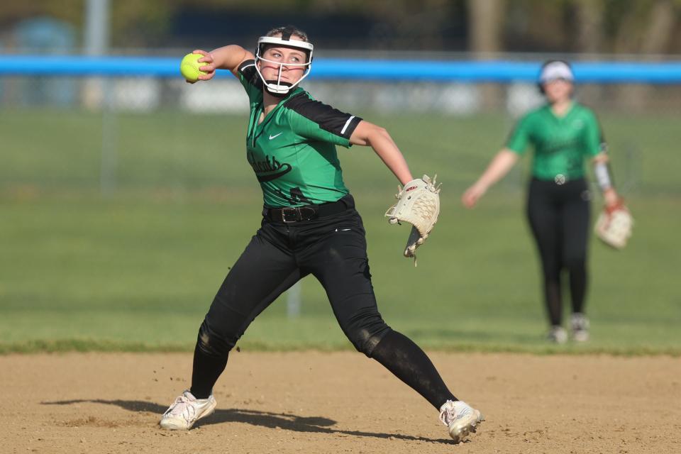 Mogadore shortstop Lily Hotchkiss turns to make a play off a ground ball hit during Monday night’s game at Rootstown High School.