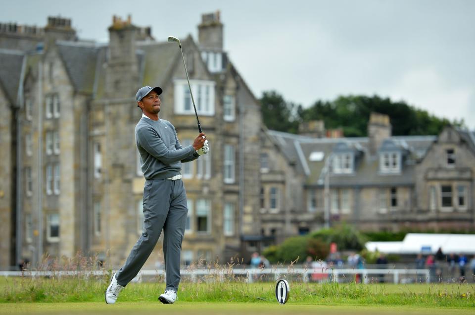 July 16, 2015 -- Tiger Woods watches his shot from the second tee during his first round at the British Open.