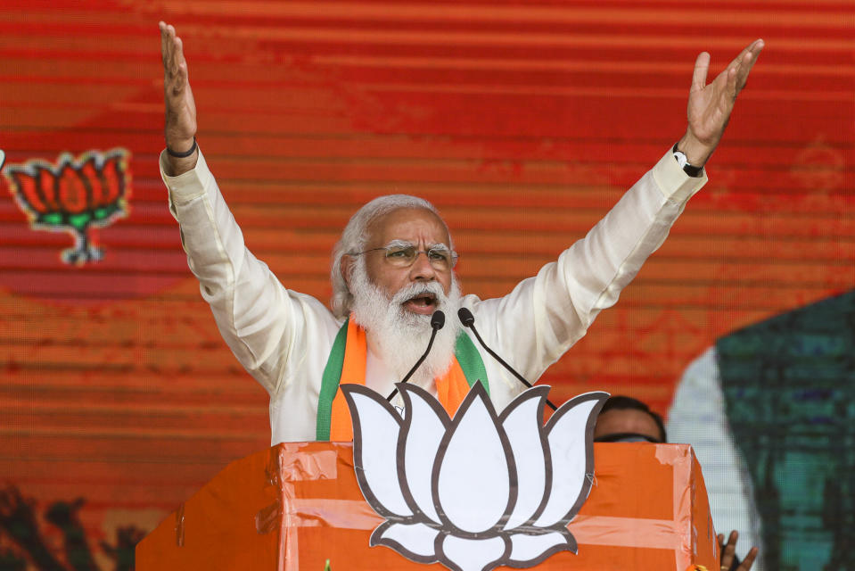 FILE - In this Sunday, March 7, 2021 file photo, Indian Prime Minister Narendra Modi addresses a public rally ahead of West Bengal state elections in Kolkata, India. The coronavirus pandemic has upended life around the globe, but it has hasn’t stopped the spread of authoritarianism and extremism. Some researchers believe it may even have accelerated it, but curbing individual freedoms and boosting the reach of the state. Since COVID-19 hit, Hungary has banned children from being told about homosexuality. China shut Hong Kong’s last pro-democracy newspaper. Brazil’s president has extolled dictatorship. Belarus has hijacked a passenger plane. A Cambodian human rights lawyer calls the pandemic “a dictator's dream opportunity.” But there are also resistance movements, as protesters from Hungary to Brazil take to the streets to defend democracy. (AP Photo/Bikas Das, File)