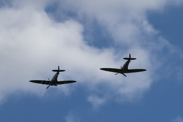 Two spitfires from the Battle of Britain Memorial  performed a flypast 