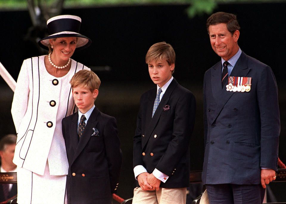 Princess Diana (1961 - 1997), Prince Harry, Prince William and Prince Charles at a parade in the Mall, London, during V.J. Day commemorations, August 1994. Diana is wearing a Tomasz Starzewski suit and a hat by Philip Somerville. (Photo by Terry Fincher/Getty Images)