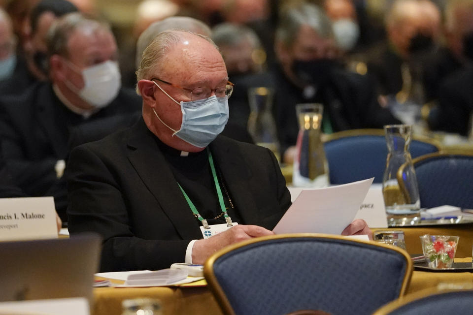 A bishop wears a mask to protect the spread of COVID-19 during the Fall General Assembly meeting of the United States Conference of Catholic Bishops, Tuesday, Nov. 16, 2021, in Baltimore.(AP Photo/Julio Cortez)