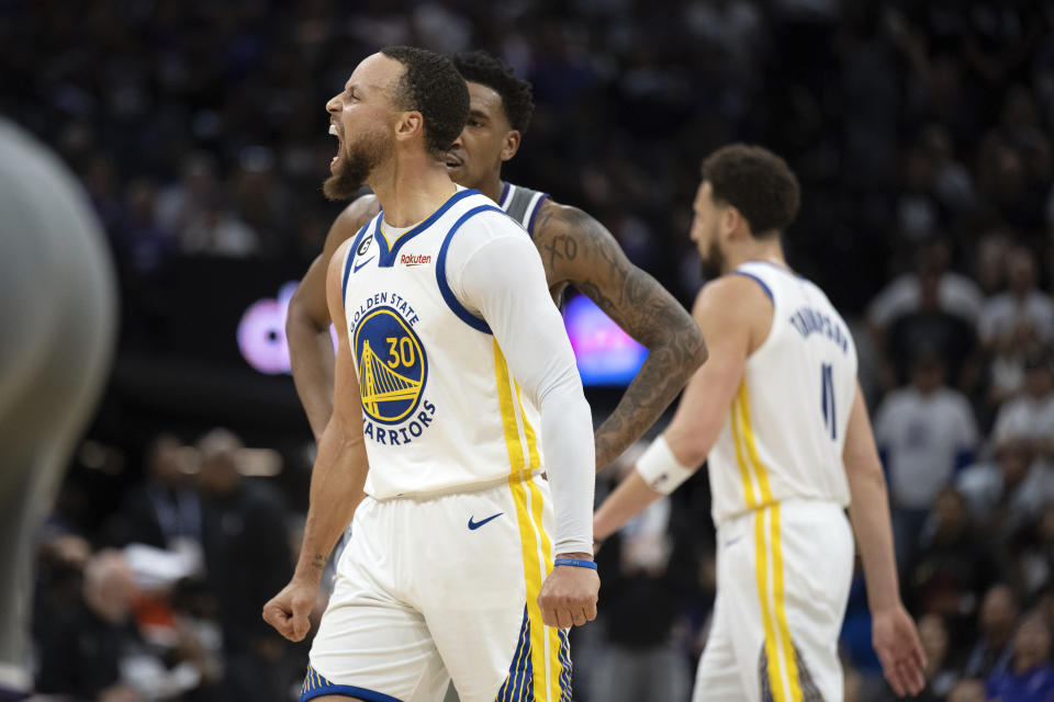 Golden State Warriors guard Stephen Curry lets out a scream after making a basket against the Sacramento Kings during the second half of Game 5 of their NBA first-round playoff series on April 26, 2023, in Sacramento. (AP Photo/José Luis Villegas)
