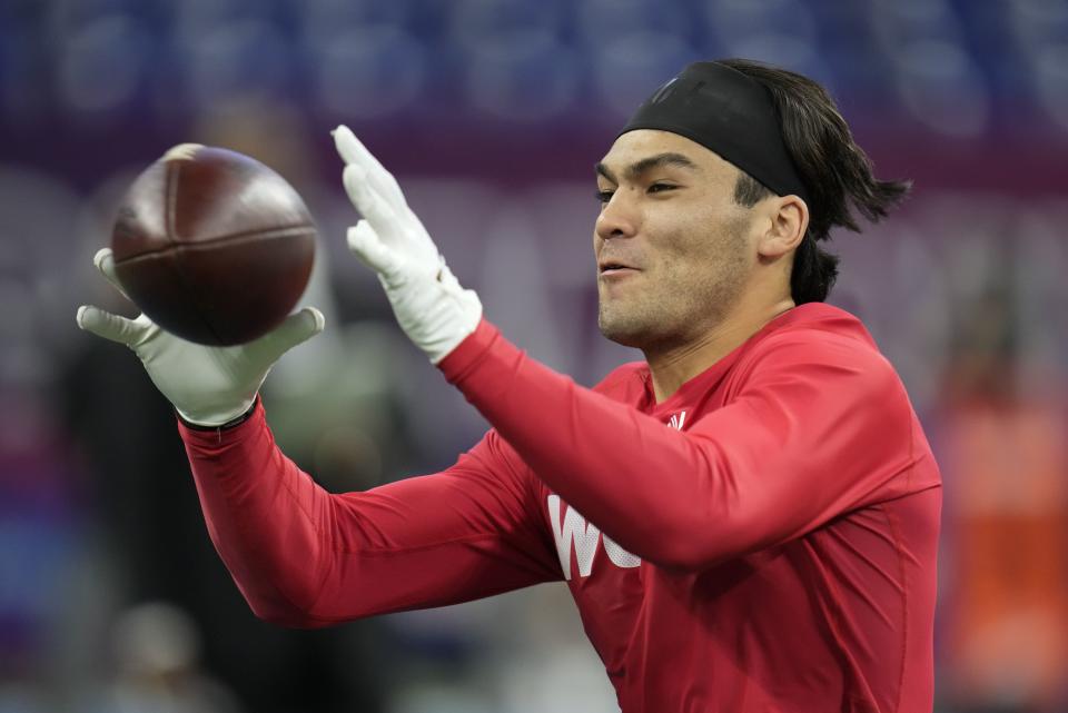 BYU wide receiver Puka Nacua runs a drill at the NFL football scouting combine in Indianapolis, Saturday, March 4, 2023. | Michael Conroy, Associated Press