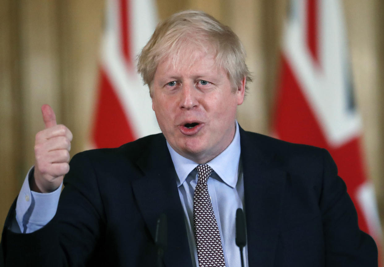 Britain's Prime Minister Boris Johnson speaks during a press conference at Downing Street on the government's coronavirus action plan in London, Tuesday, March 3, 2020.  Johnson is announcing plans for combating the spread of the new COVID-19 coronavirus in UK.(AP Photo/Frank Augstein, Pool)