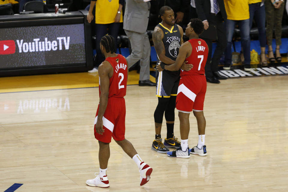 OAKLAND, CALIFORNIA - JUNE 13: Andre Iguodala #9 of the Golden State Warriors and Kyle Lowry #7 of the Toronto Raptors embrace after Game Six of the 2019 NBA Finals at ORACLE Arena on June 13, 2019 in Oakland, California. NOTE TO USER: User expressly acknowledges and agrees that, by downloading and or using this photograph, User is consenting to the terms and conditions of the Getty Images License Agreement. (Photo by Lachlan Cunningham/Getty Images)