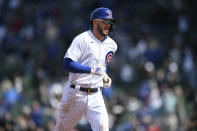 Chicago Cubs Kris Bryant rounds the bases after hitting a two-run home run during the fifth inning of a baseball game against the Atlanta Braves Saturday, April 17, 2021, in Chicago. (AP Photo/Paul Beaty)