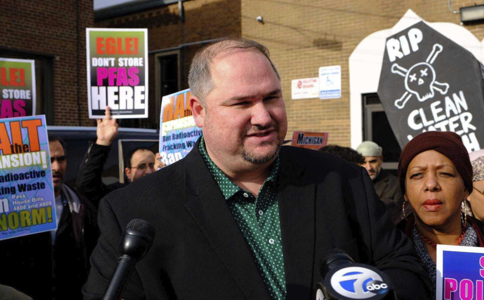 Image: State Rep. Isaac Robinson protest with community members in Detroit on Dec. 27, 2019. Robinson died on March 29, 2020, possibly from coronavirus. (Sarah Rahal / Detroit News via AP file)