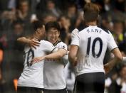 Britain Soccer Football - Tottenham Hotspur v AFC Bournemouth - Premier League - White Hart Lane - 15/4/17 Tottenham's Son Heung-min celebrates scoring their second goal with Dele Alli and Harry Kane Reuters / Dylan Martinez