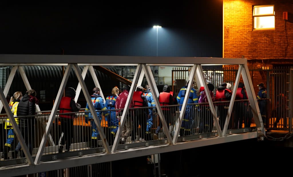 A group of people thought to be migrants are brought in to Dover (Gareth Fuller/PA) (PA Wire)