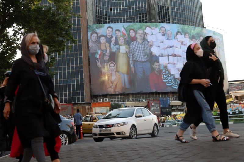 FILE PHOTO: A banner of the presidential election is seen in Valiasr square in Tehran