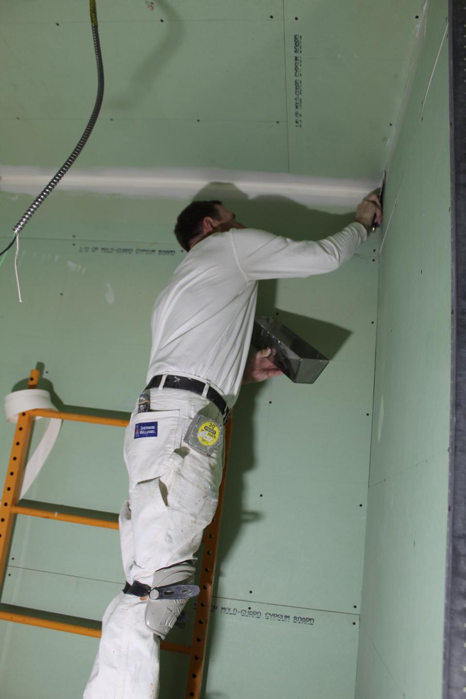 Volunteers have been working to hang the drywall on the framed-in rooms, as well as mud the joints, sand those and get the entire interior of the building ready for painting.