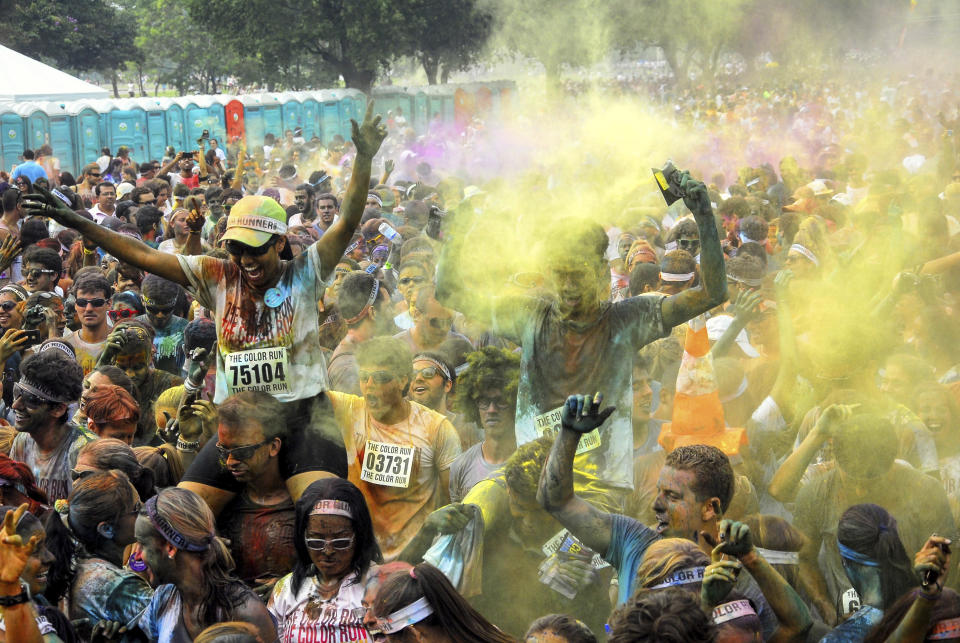 RIO DE JANEIRO, BRAZIL - DECEMBER 16: People celebrate during The Color Run on December 16, 2012 in Rio de Janeiro, Brazil. (Photo by Ronaldo Brandao/NewsFree/LatinContent/Getty Images)