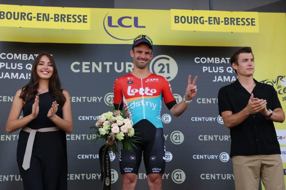 Lotto Dstnys Belgian rider Victor Campenaerts celebrates on the podium with the most combative riders award after the 18th stage of the 110th edition of the Tour de France cycling race 184 km between Moutiers and BourgenBresse in the French Alps on July 20 2023 Photo by Thomas SAMSON  AFP Photo by THOMAS SAMSONAFP via Getty Images