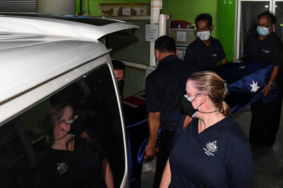 Shane Warne's body, pictured here being loaded into a vehicle at the Police General Hospital in Bangkok.