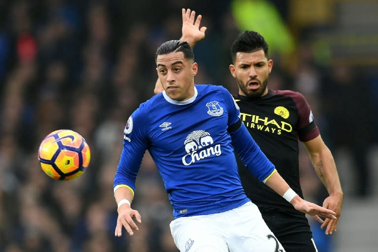 Everton defender Ramiro Funes Mori (L) vies with Manchester City striker Sergio Aguero during the English Premier League match at Goodison Park in Liverpool, north-west England on January 15, 2017