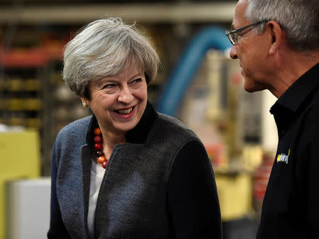 Britain's Prime Minister Theresa May makes a campaign stop at a company in St Yves, Cornwall, May 2, 2017. REUTERS/Dylan Martinez