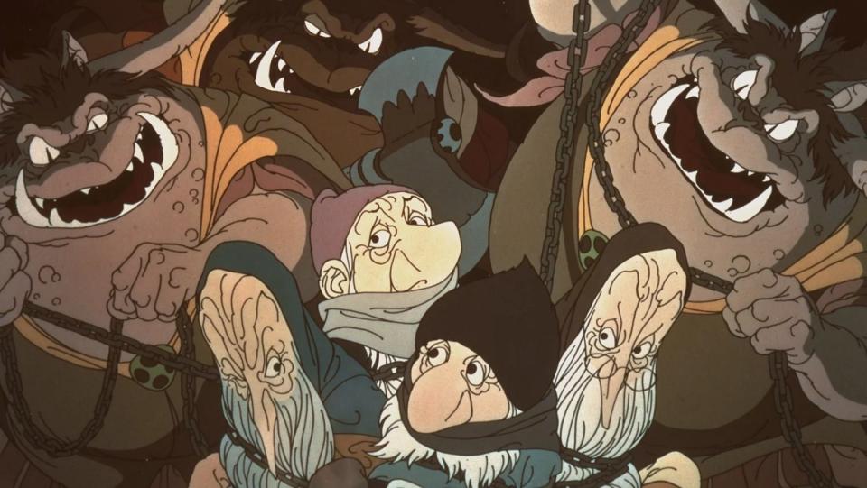 A band of goblins with gnashing teeth surround the tied-up Dwarves in the 1977 animated version of The Hobbit.