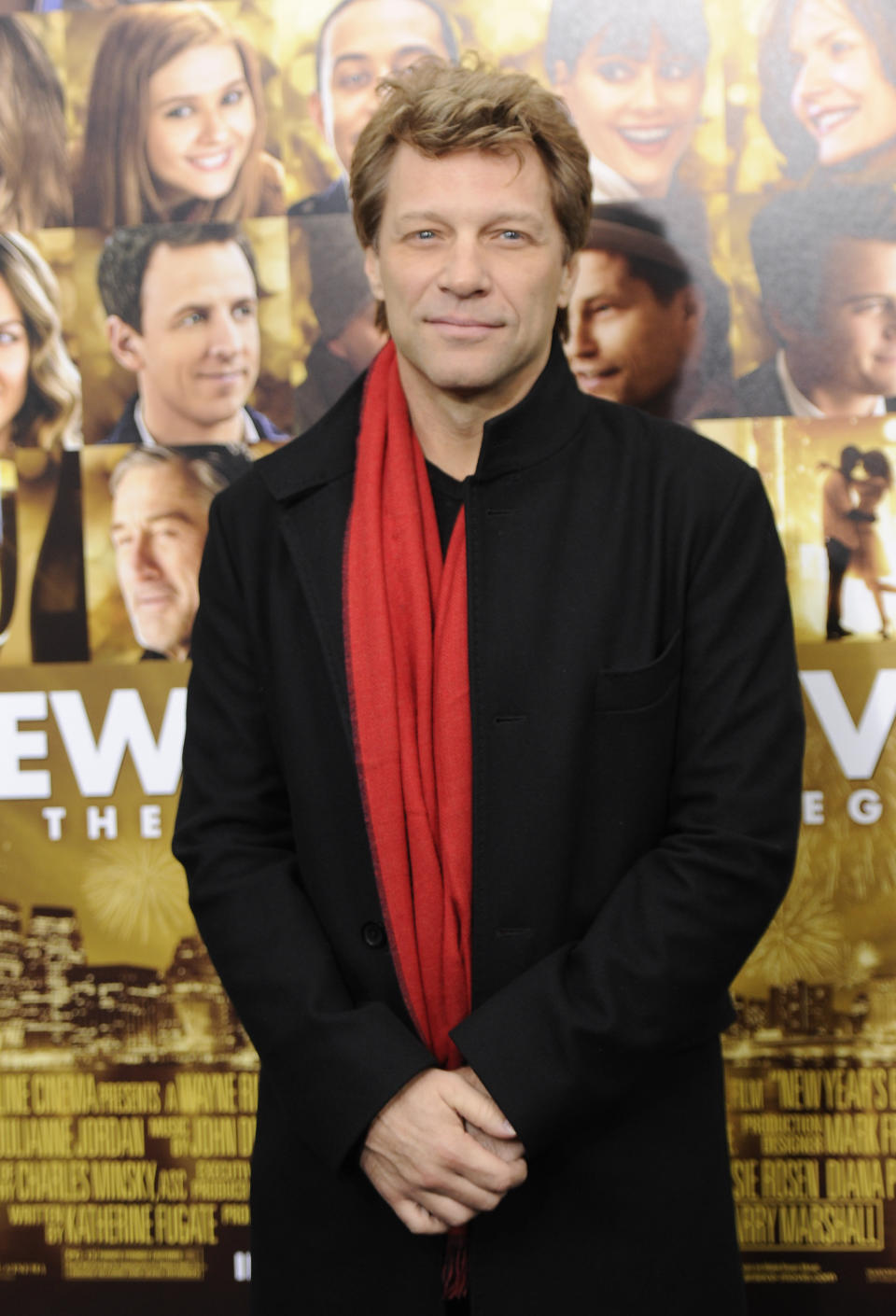 FILE - This Dec. 7, 2011 file photo shows singer Jon Bon Jovi attending the premiere of "New Year's Eve" at Ziegfeld Theatre in New York. A New Jersey man will face five years in prison after pleading guilty to a string of burglaries at the Jersey shore, including the home of rocker Jon Bon Jovi. Nicholas Tracy of Beachwood pleaded guilty Tuesday to three counts of theft and burglary from a spree that netted him more than $300,000 worth of jewelry and personal items from the homes. The thefts took place in March and April 2011 along the Middletown Township road where Bon Jovi lives. (AP Photo/Evan Agostini, file)