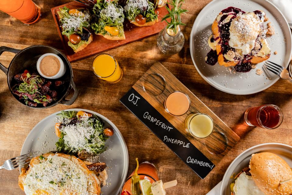 Brunch table and mimosa flight at Whiskey Cake.