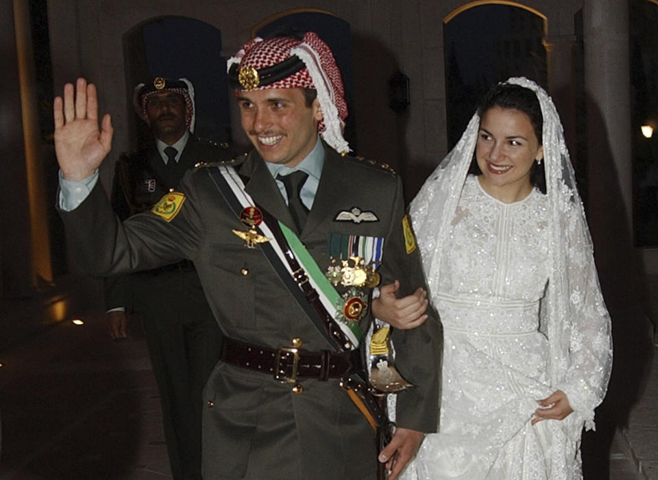 File - In this May 27, 2004, file photo, Jordan's Prince Hamzeh and his wife Princess Noor, arrive at Zahran Palace where they celebrate their wedding ceremony in Amman, Jordan. Prince Hamza, the half-brother of Jordan's King Abdullah II, said he has been placed under house arrest. in a videotaped statement late Saturday, April 3, 2021. (AP Photo/Hussein Malla, File)