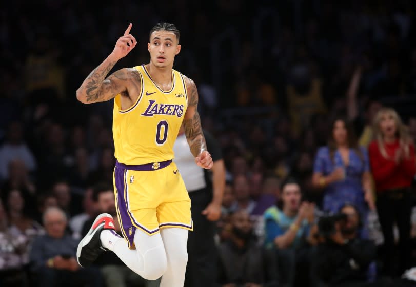 Kyle Kuzma after making a three-point shot against the Oklahoma City Thunder at Staples Center on November 19, 2019.