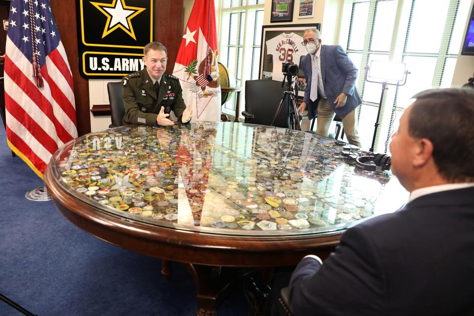 Gen. James McConville, Chief of Staff of the Army, responds to a question by Mayor Thomas Koch during an interview held in the General's office at the Pentagon in July 2021.