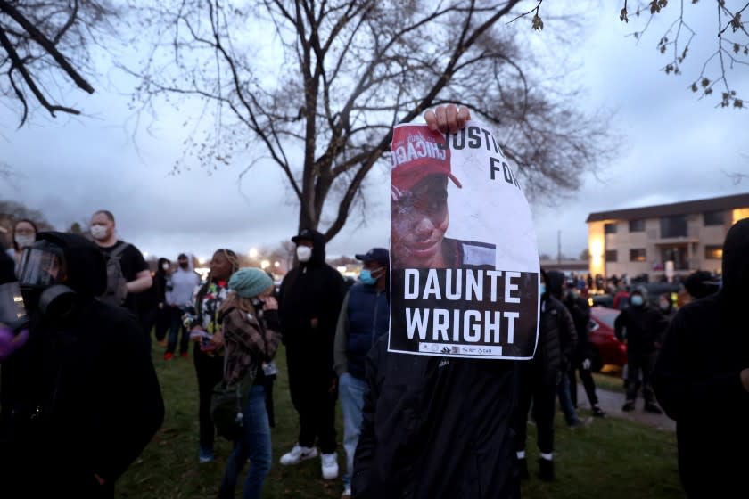 BROOKLYN CENTER, MINNESOTA - APRIL 12: Demonstrators face off with police outside of the Brooklyn Center police station on April 12, 2021 in Brooklyn Center, Minnesota. People have taken to the streets to protest after Daunte Wright, a 20-year-old Black man, was shot and killed by Brooklyn Center police officer Kimberly Potter during a traffic stop yesterday. (Photo by Scott Olson/Getty Images)