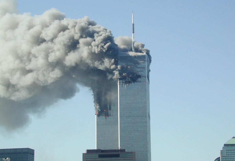 Pictured: The twin tours in New York filled with smoke following 9/11 attack. Image: Getty