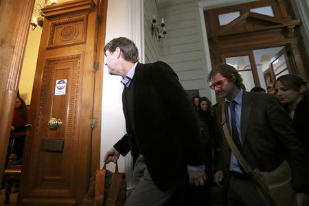 FILE PHOTO: James Hamilton and Juan Andres Murillo, victims of clerical sexual abuse in Chile, attend a court seeking compensation in civil case in Santiago, Chile, October 18, 2018. REUTERS/Ivan Alvarado/File Photo