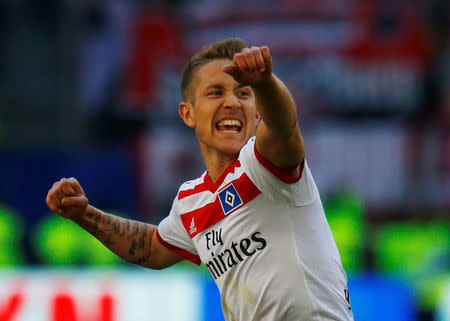 Soccer Football - Bundesliga - Hamburger SV vs SC Freiburg - Volksparkstadion, Hamburg, Germany - April 21, 2018 Hamburg's Lewis Holtby celebrates after the match REUTERS/Morris Mac Matzen