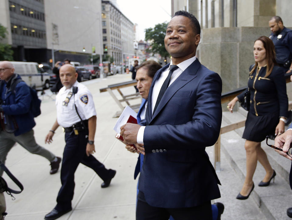 FILE - In this June 13, 2019 file photo, Cuba Gooding Jr. leaves criminal court in New York. U.S. District Judge Paul Crotty issued a default judgment against Gooding on Thursday, July 29, 2021, saying it appeared the Oscar-winning "Jerry Maguire" star was willfully ignoring the lawsuit and that waiting for him any longer would be unfair to his accuser. Crotty said that under the law, the 53-year-old Gooding's failure to respond and defend himself in the lawsuit constituted an admission of liability. (AP Photo/Frank Franklin II, File)